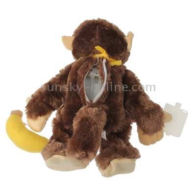 stuffed toy monkey with banana