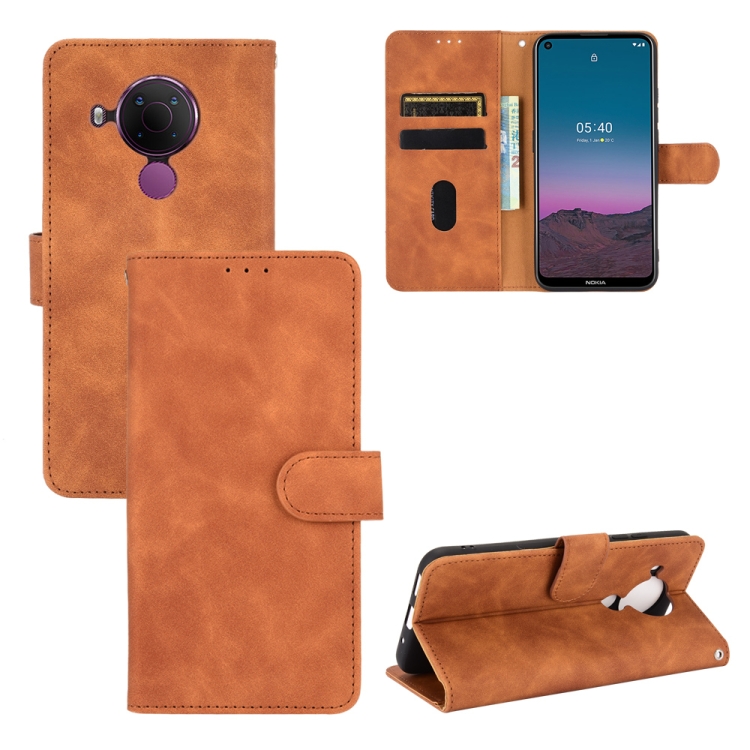 

For Nokia 5.4 Solid Color Skin Feel Magnetic Buckle Horizontal Flip Calf Texture PU Leather Case with Holder & Card Slots & Wallet(Brown)