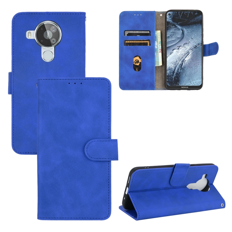

For Nokia 7.3 Solid Color Skin Feel Magnetic Buckle Horizontal Flip Calf Texture PU Leather Case with Holder & Card Slots & Wallet(Blue)