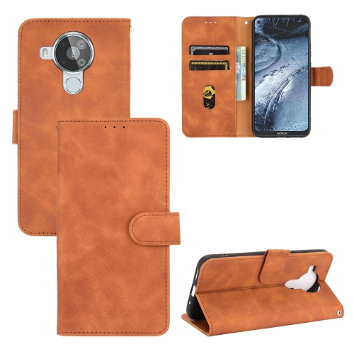 

For Nokia 7.3 Solid Color Skin Feel Magnetic Buckle Horizontal Flip Calf Texture PU Leather Case with Holder & Card Slots & Wallet(Brown)