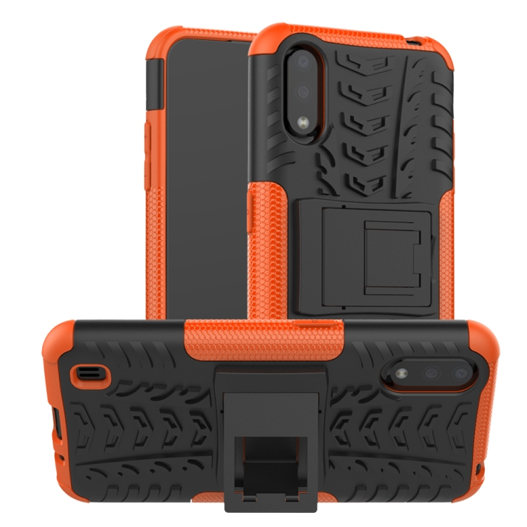 

For Galaxy A01 Tire Texture Shockproof TPU+PC Protective Case with Holder(Orange)