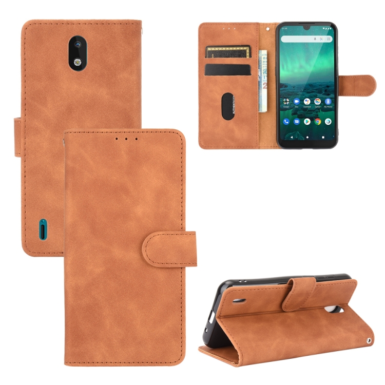 

For Nokia 1.3 Solid Color Skin Feel Magnetic Buckle Horizontal Flip Calf Texture PU Leather Case with Holder & Card Slots & Wallet(Brown)