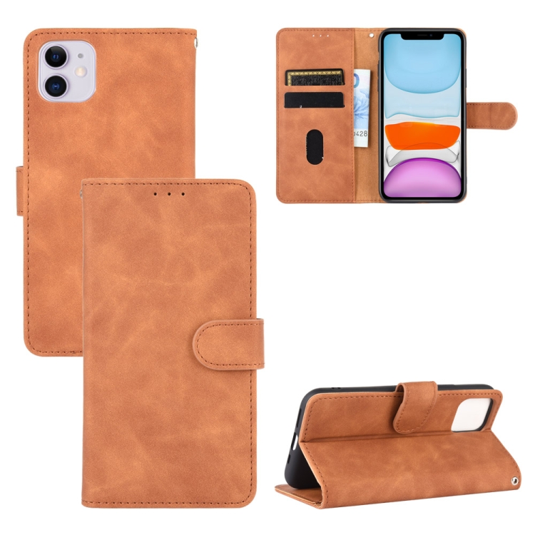 

For iPhone 12 / 12 Pro Solid Color Skin Feel Magnetic Buckle Horizontal Flip Calf Texture PU Leather Case with Holder & Card Slots & Wallet(Brown)