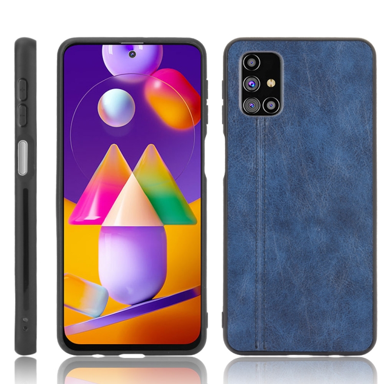 

For Samsung Galaxy M31s Shockproof Sewing Cow Pattern Skin PC + PU + TPU Case(Blue)