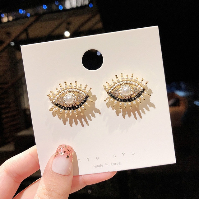 

Retro Exaggerated Creative Pearl Eyes Shape Earrings(E1138 White)
