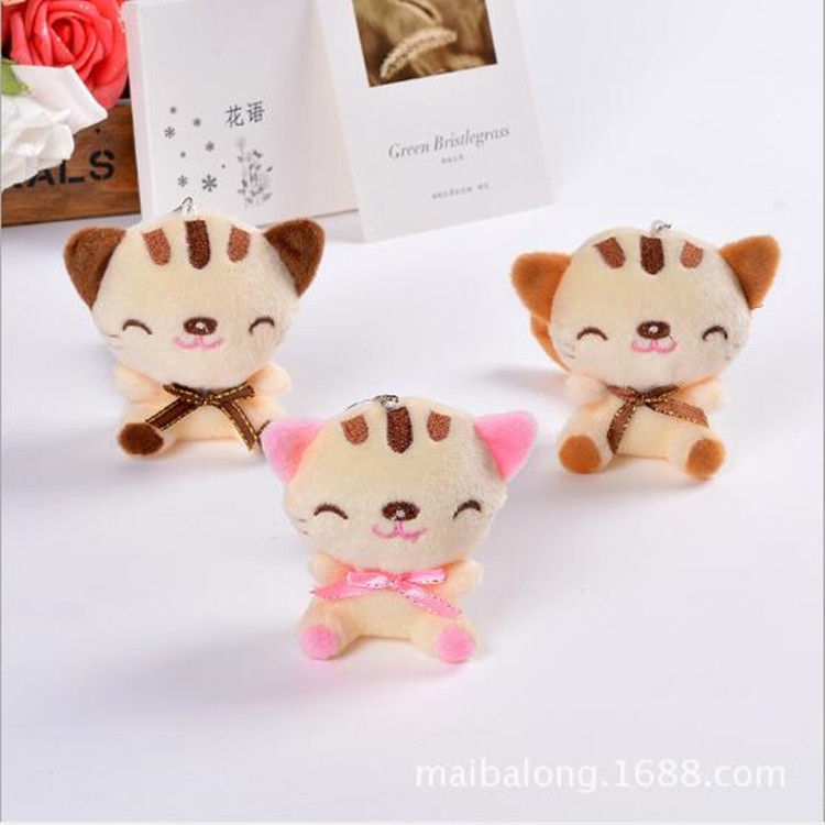 

Plush Toy Doll Sitting Smiley Cat Mobile Phone Pendant Key Chain Kitten Doll Wedding Gift, Random Color Delivery(Height 9cm)